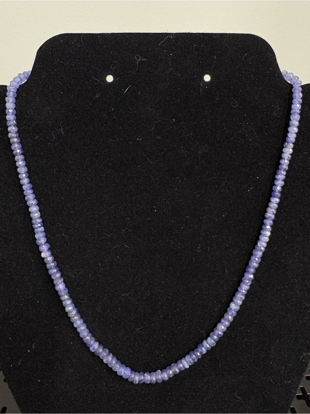 Faceted tanzanite and sterling silver necklace. 17 inches with 2 inch extender